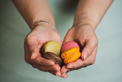 Midsection of woman holding ice cream