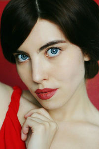 Close-up portrait of woman red lips make-up makeup blue eyes  magazine
