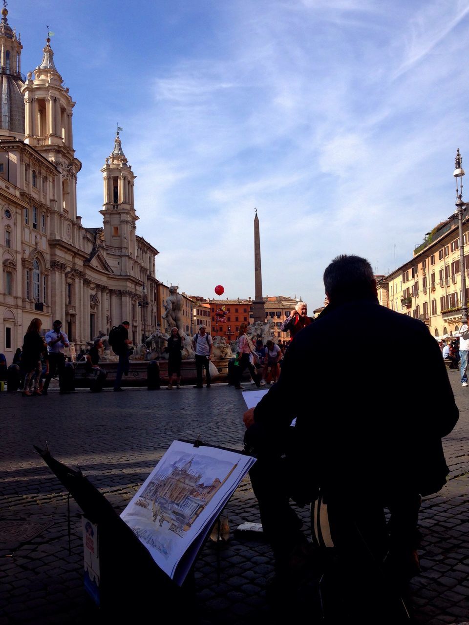 architecture, building exterior, built structure, large group of people, men, sky, person, religion, tourism, travel destinations, tourist, tower, church, city, cloud - sky, famous place, city life, place of worship, outdoors, day, history, memories, culture