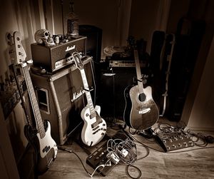 High angle view of guitar at home