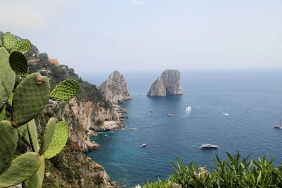 Scenic view of bay against clear sky