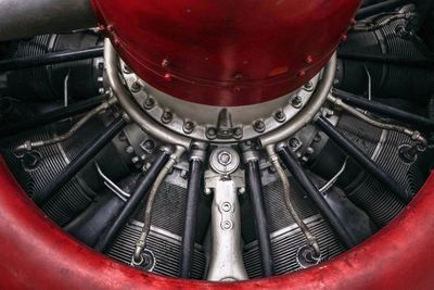 Close-up of red machinery in factory