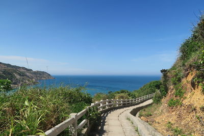 Panoramic view of road leading towards sea