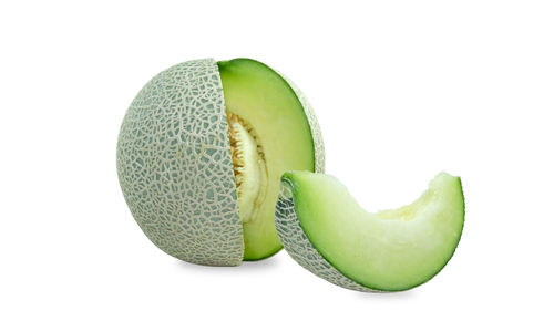 Close-up of fruits against white background