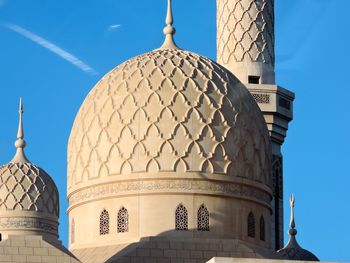 Historic mosque against blue sky