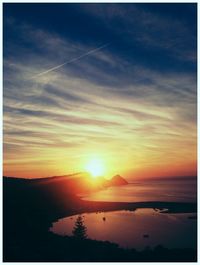 Scenic view of sea at sunset