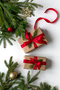 Directly above shot of christmas decorations on white background