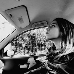 Close-up of woman in car