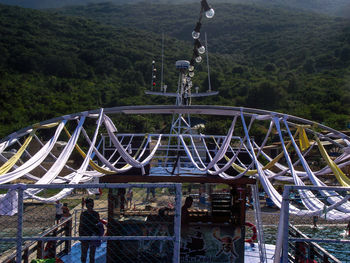 Metallic structure in playground against sky