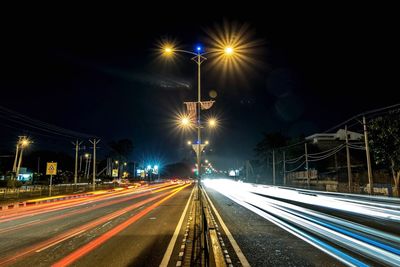 Light trails on road at night