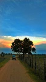 Road passing through field