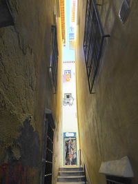 Narrow alley amidst buildings in city