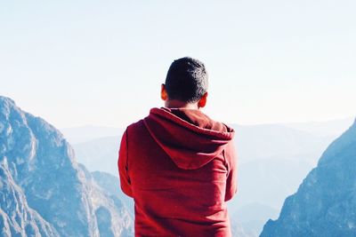 Woman standing on mountain