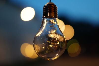 Close-up of illuminated bottle