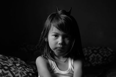 Portrait of cute girl in darkroom