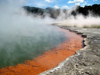 Hot spring during foggy weather on sunny day