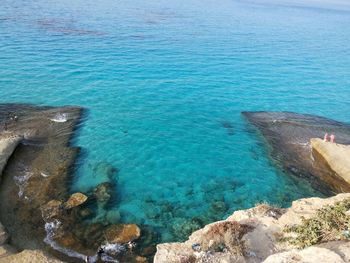 Scenic view of sea against blue sky