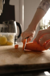 Midsection of man working at table