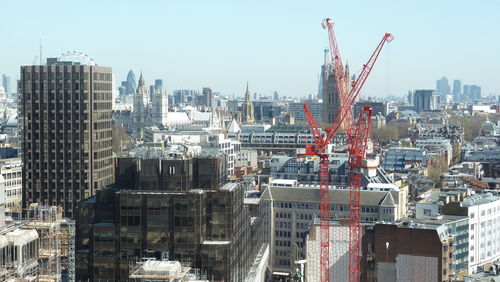 Aerial view of cityscape against clear sky