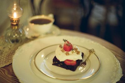 Close-up of cake served on table