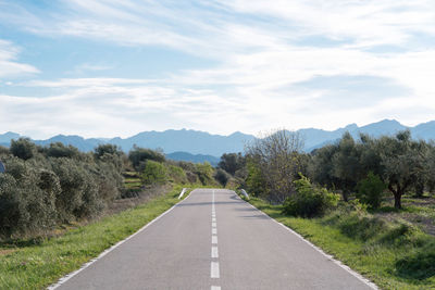 Road ahead with mountain background