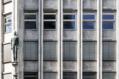 Full frame shot of building with sculpture