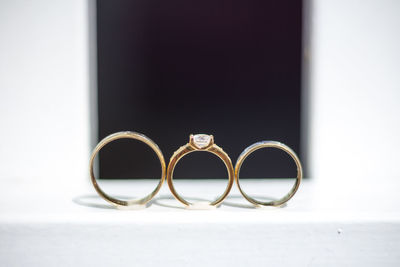 Close-up of various rings in box