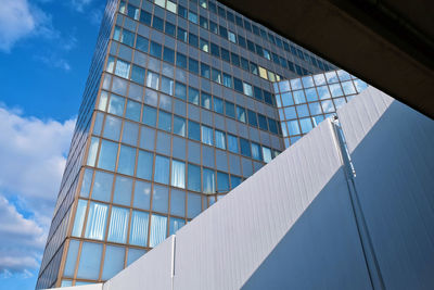 Low angle view of modern building against sky