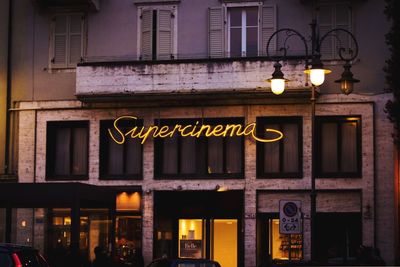 Low angle view of illuminated building at night