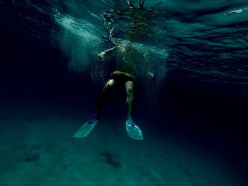 Man swimming in sea