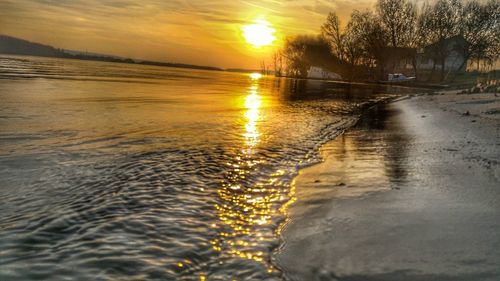 Scenic view of sea against sky at sunset