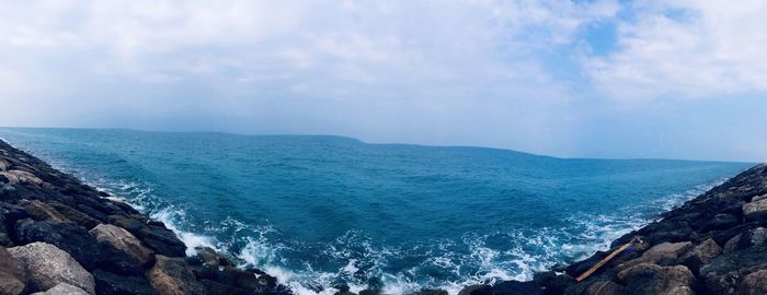 Panoramic view of sea against sky