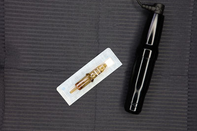 High angle view of cigarette on table