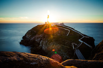 Scenic view of sea against sky during sunset