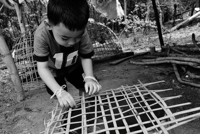 High angle view of boy looking at farm