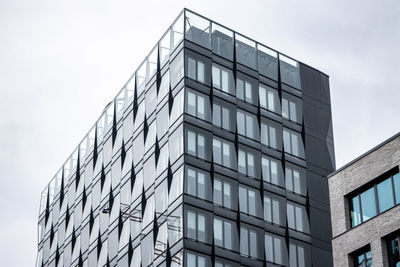 Low angle view of modern building against sky