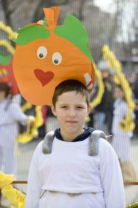 Portrait of boy standing outdoors