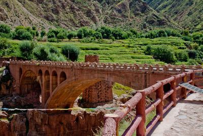 Arch bridge over mountains