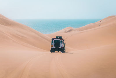 Scenic view of desert against sky