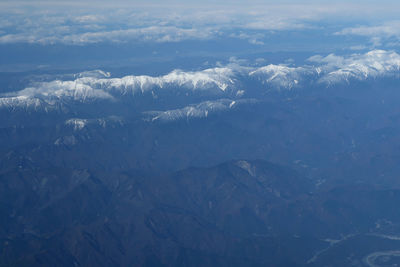 Aerial view of snow covered landscape