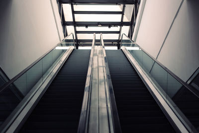 Low angle view of escalators at subway