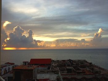 Dramatic sky over sea during sunset