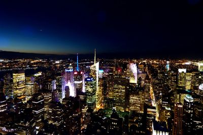 Illuminated cityscape at night