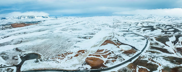 Aerial video of an empty lava fields and huge volcanic mountain in iceland