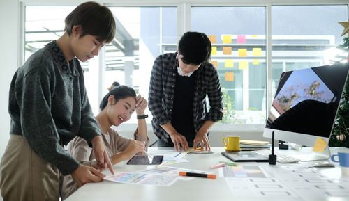 Group of people working on table