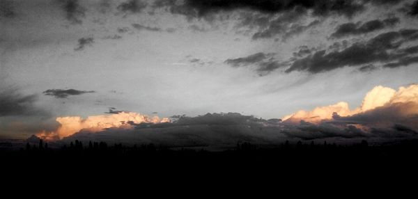 Scenic view of silhouette landscape against sky