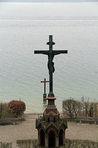 Cross on column