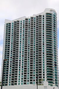 Low angle view of modern buildings against clear sky