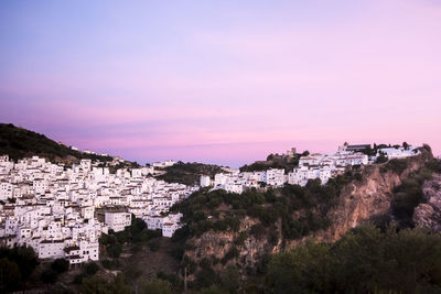 High angle view of buildings against sky during sunset