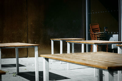 Empty chairs and table in restaurant